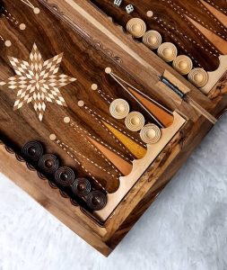 Introducing exquisite backgammon