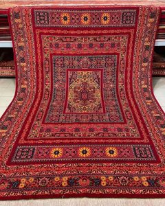 How do I identify a Tabriz rug